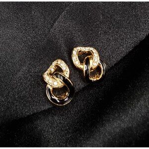 Vintage 1990s Christian Dior Gold Plated Knot Earrings With Black Enamel